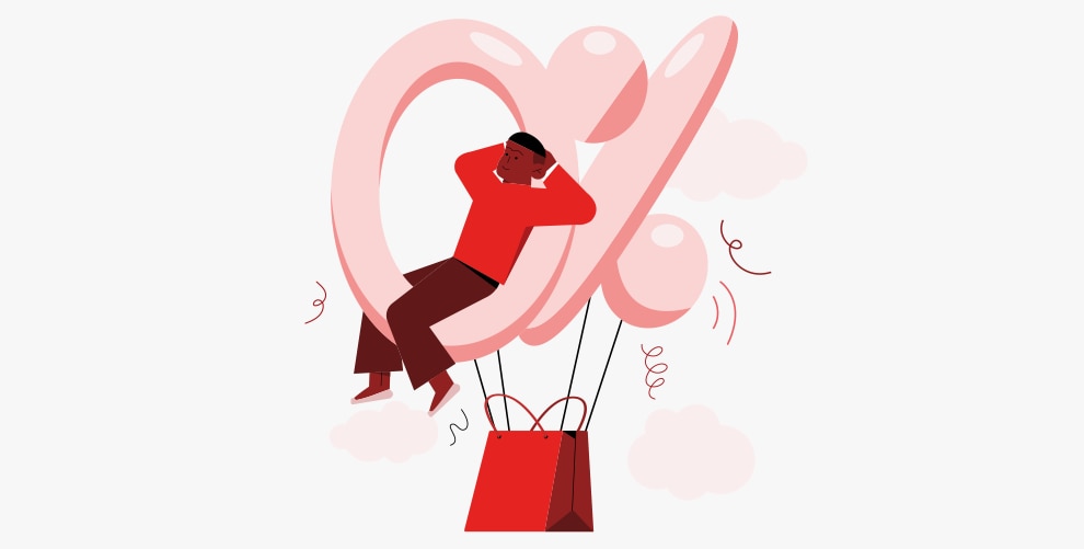 Eine Person sitzt in dem Ballon eines Heißluftballons
